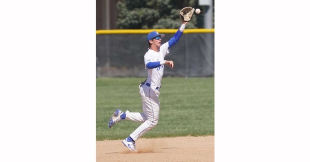 MCC’s Landon McKillip goes for a high-hopper and turns it into a doubleplay Monday against Colby.